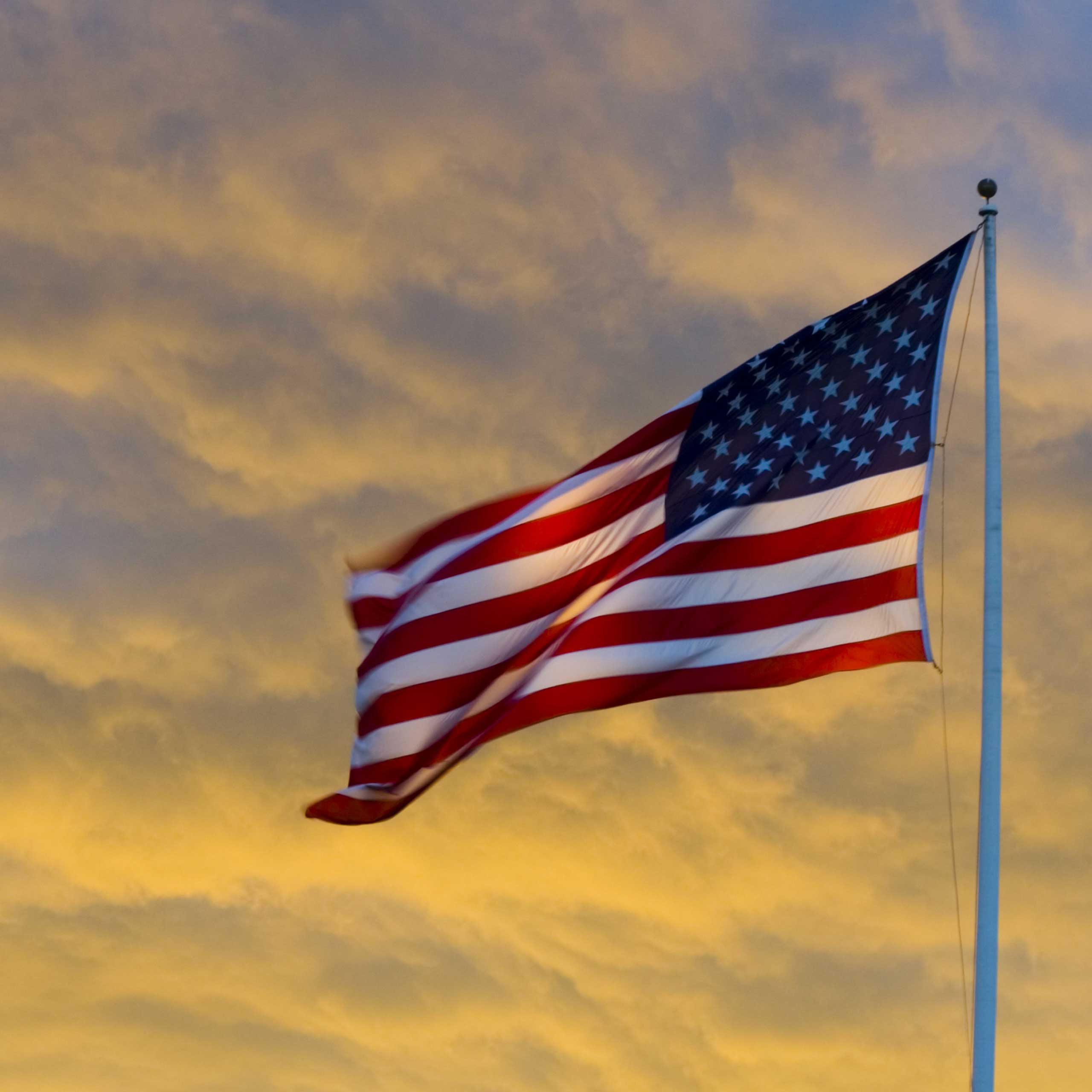 American flag at sunrise